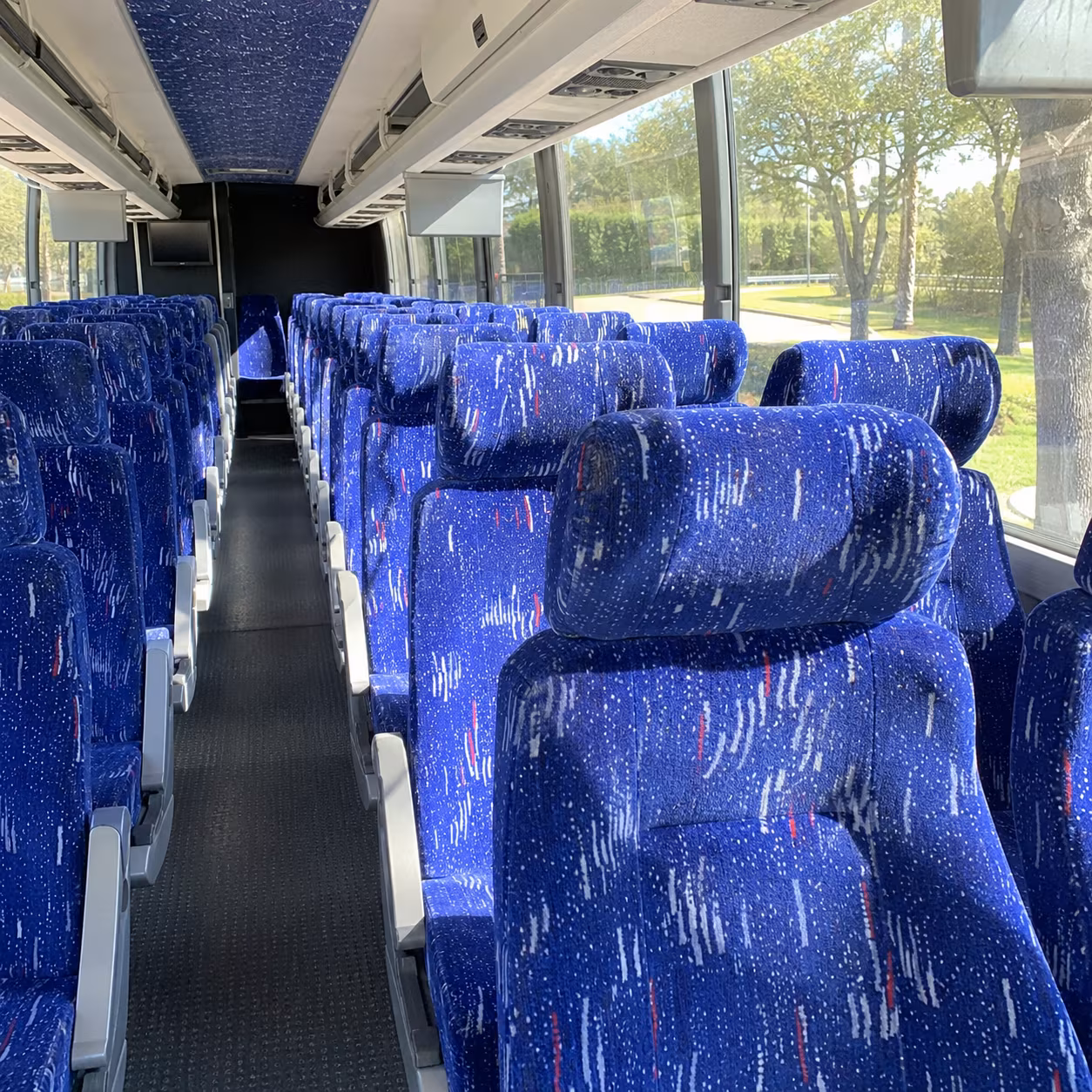 how one way transfers round trips and multi day bookings are priced for bus rentals in elizabeth new jersey